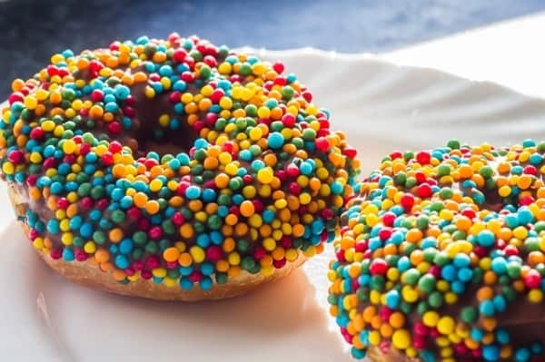 Donut wiht chocolate icing and sprinkles